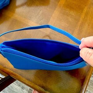 Beck brand leather wristlet in cobolt blue